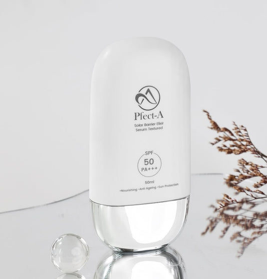 Luxe bottle of Pfect-A Solar Elixir featuring Niacinamide, Peptides, and Ginseng to brighten skin and defend against environmental stressors while providing broad-spectrum UV protection.