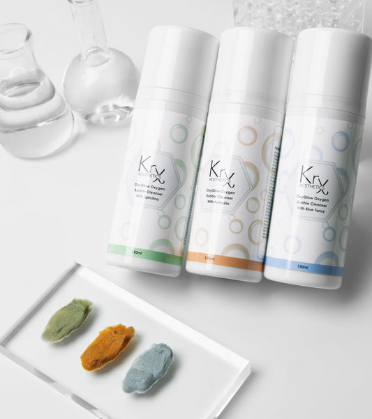 Close-up of the blue tansy infused bubbles in KrX OxyGlow; a vasoconstricting Korean skincare solution that solves "facial flushing" by providing a cooling oxygenation process that calms blood flow and reduces surface redness.