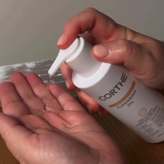 Corthe Dermo Essential Cleansing Oil, a non-comedogenic Korean oil cleanser formulated with Safflower and Rosehip oils to dissolve waterproof SPF without clogging pores.