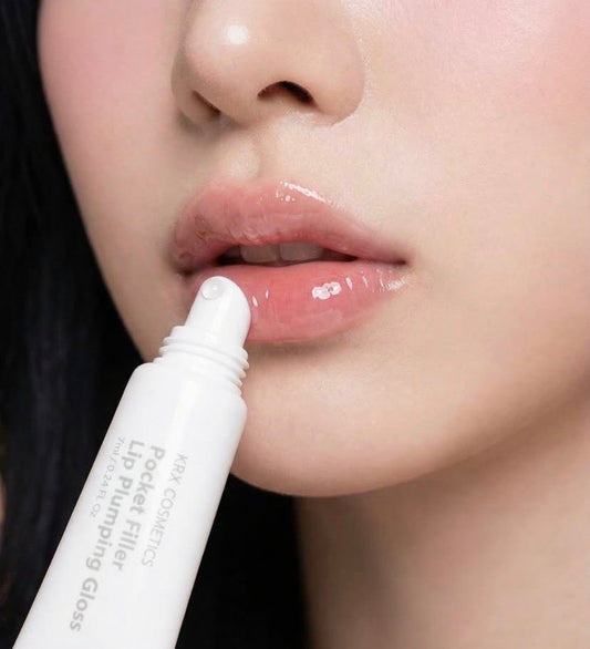 KrX Aesthetics Pocket Filler Lip Plumping Gloss in Clear, a professional-grade Korean lip treatment tube that provides instant needle-free volume and a high-shine finish.