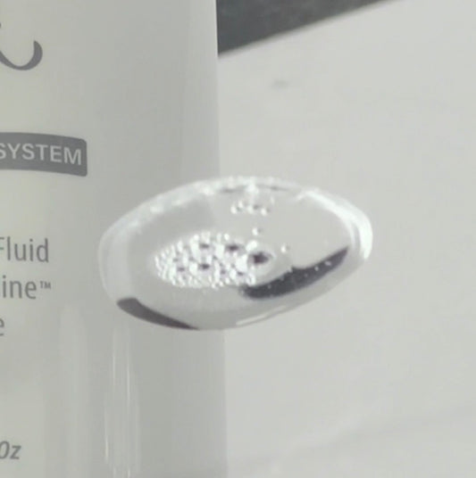 Applying KrX Youthplex Toning Solution with Volufiline for needle-free skin firming.