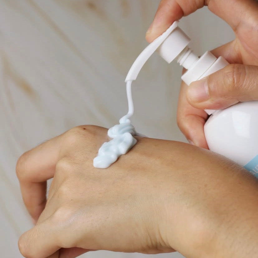 Seamless application of the AHA BHA smoothing Korean body treatment; demonstrating how the professional formula refines skin texture without leaving a greasy residue.