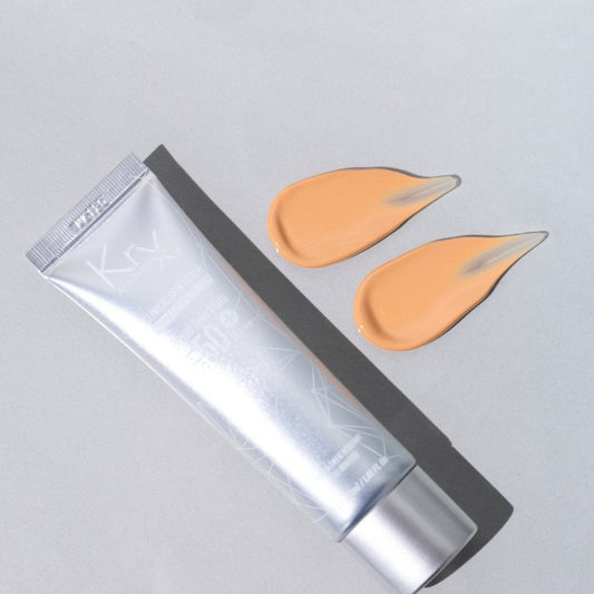 Pore-blurring tinted broad spectrum sunscreen protection with antioxidants and UVA + UVB protection