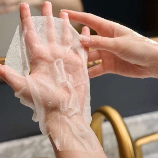 Ultra-thin Korean Cica Exosome sheet mask fabric infused with hydrating hyaluronic acid and ectoin essence.