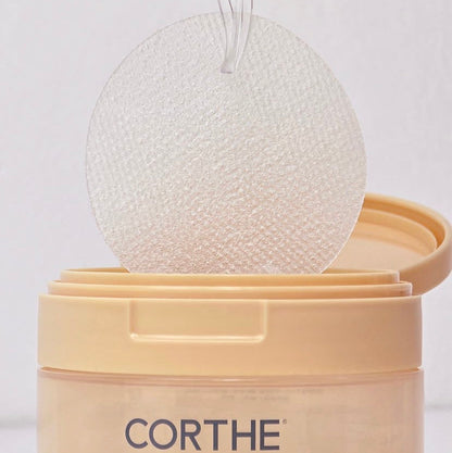 Close-up of the Corthe Collagen Gel Pad texture, showing the cooling herringbone pattern designed to grip the skin and deliver 11,000 ppb marine collagen for a plumping, anti-aging effect.