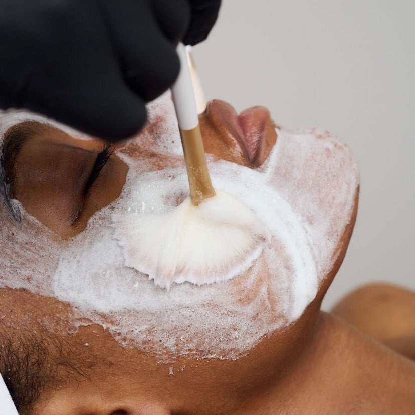 Clinical application of Corthe Super Korean Enzyme Powder foam using a facial brush to gently dissolve dead skin cells and clear pores without irritating the skin barrier.