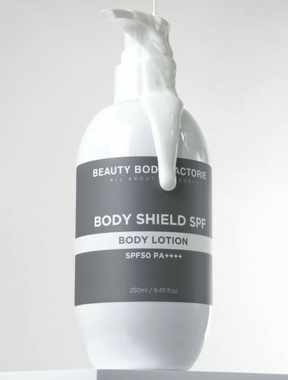 Achieving a "Glass Skin" body glow with Body Shield SPF 50; a hydrating Korean SPF that disappears into the skin with zero white cast or stickiness.