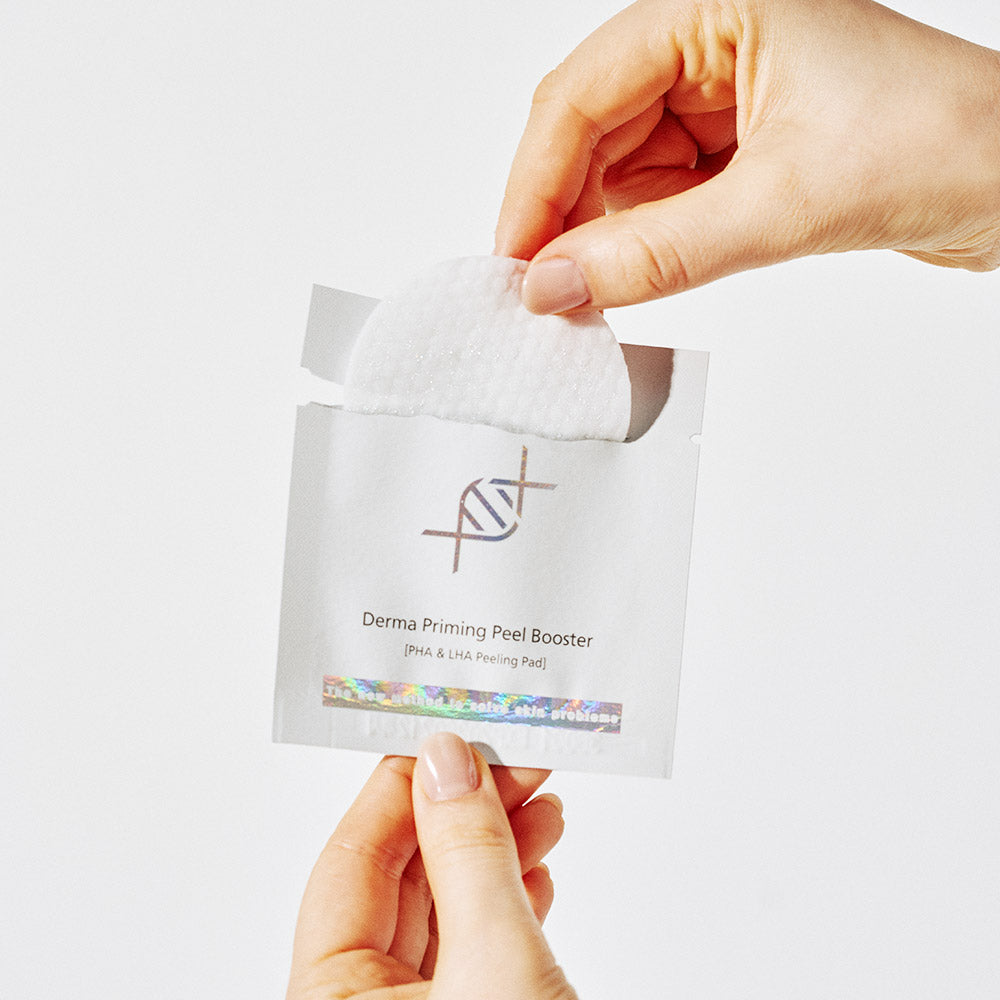 Using Dermathod Korean exfoliating peel pads to achieve a smooth, refined complexion and prepare the skin for better serum absorption.