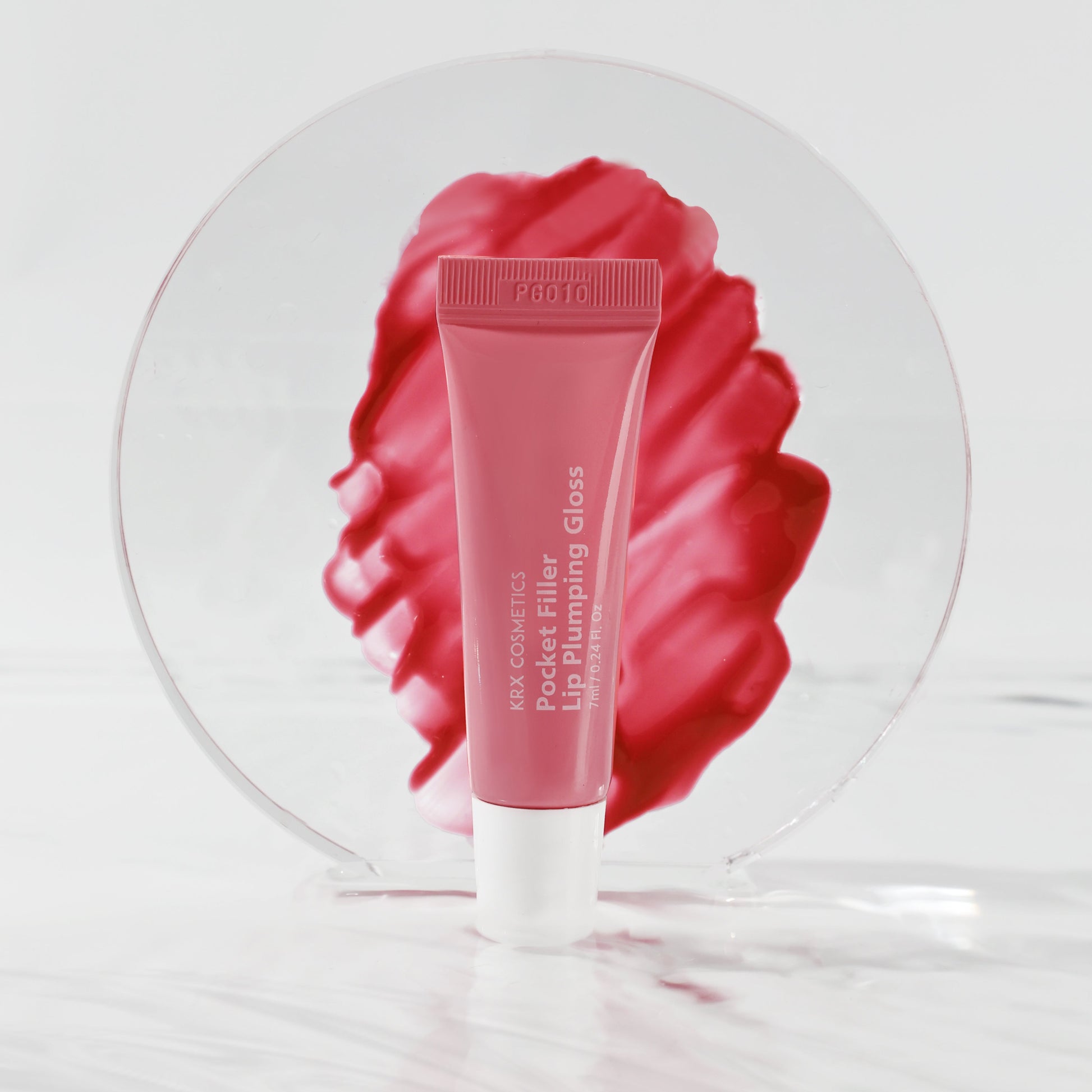 KrX Pocket Filler in Pink: A soft, rosy Korean lip plumping treatment that combines a professional-grade warming sensation with a high-shine, petal-pink finish.