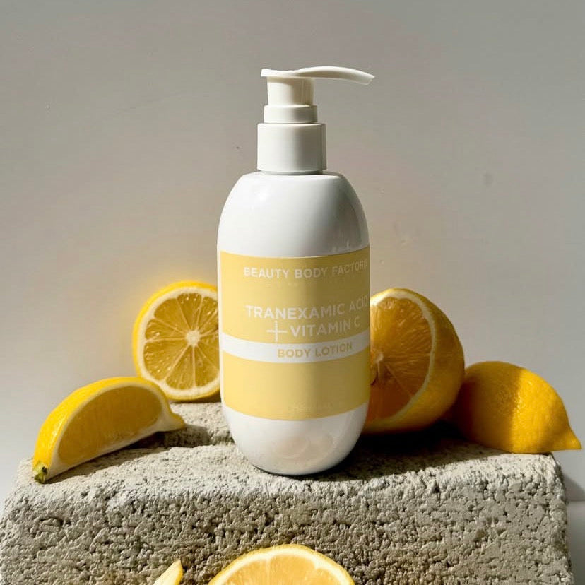 Tranexamic Acid & Vitamin Body Lotion; a targeted treatment for fading hyperpigmentation and sun damage, part of the 3-piece clinical Korean body care collection.