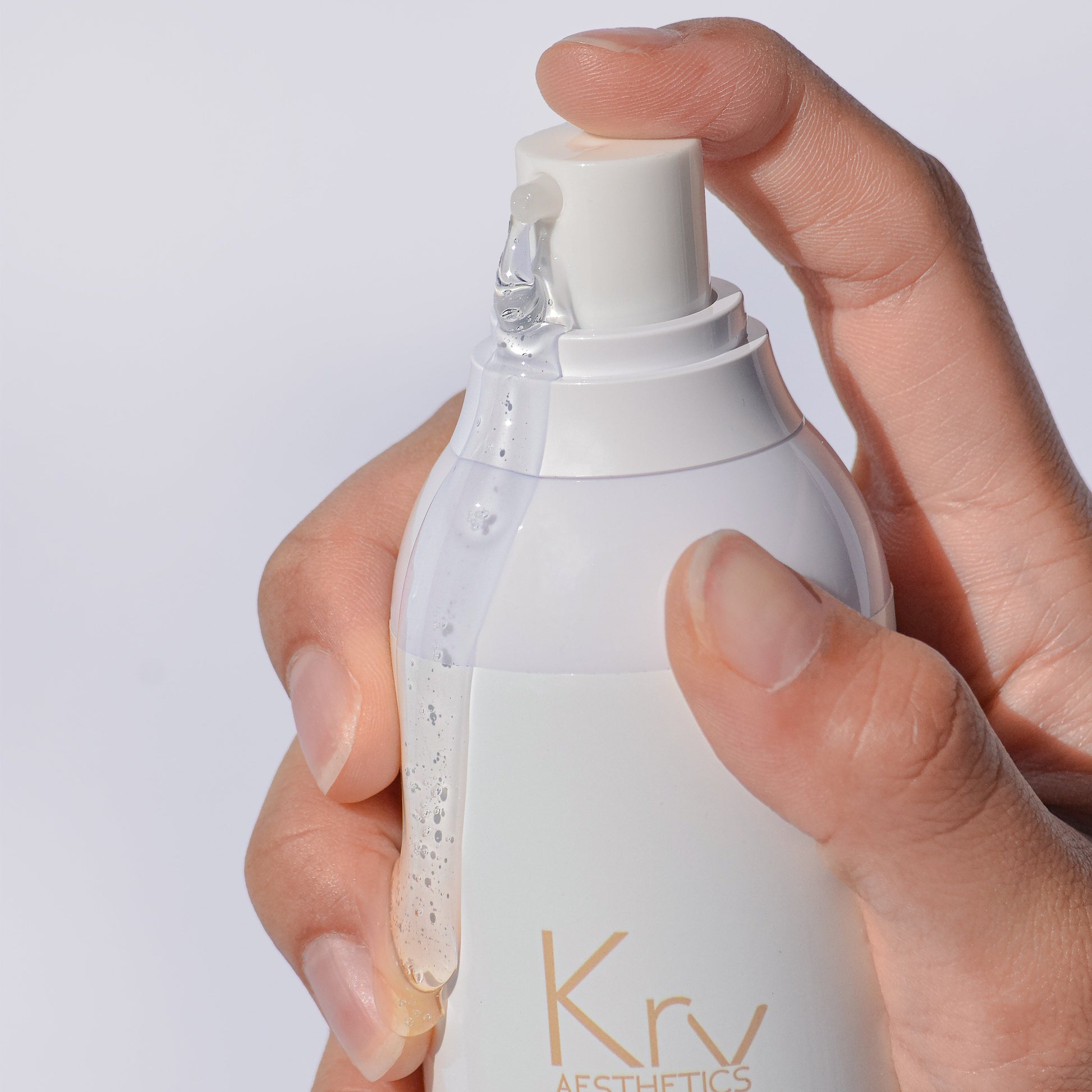 KrX Glow Gel Cleanser performing the "Oxygenating Sweep"; a second-step solution that captures micro-residues and environmental pollutants to solve sallow skin tones and prep the face for a glass-skin finish.