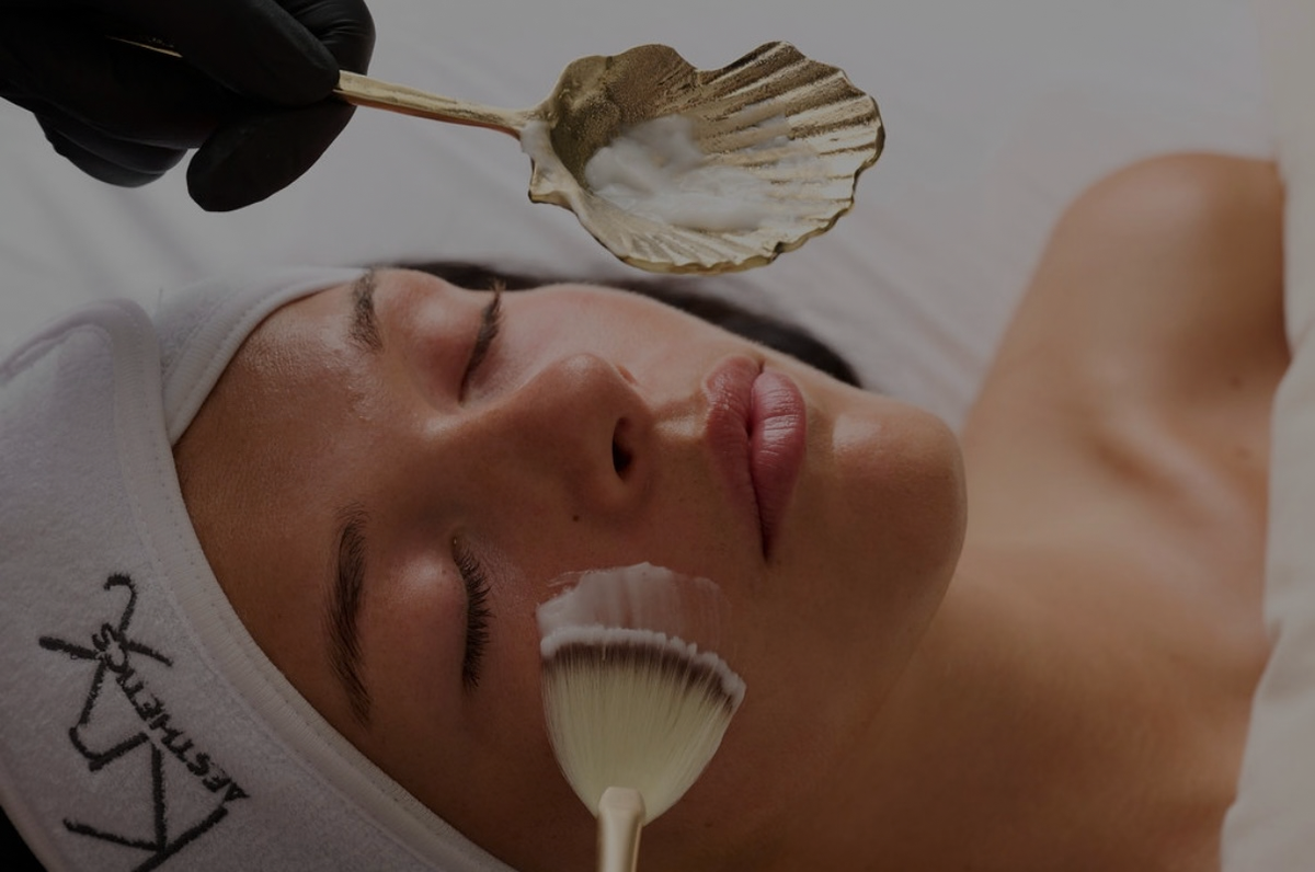 Licensed esthetician applying professional Korean skincare treatment for glowing glass skin and barrier repair.