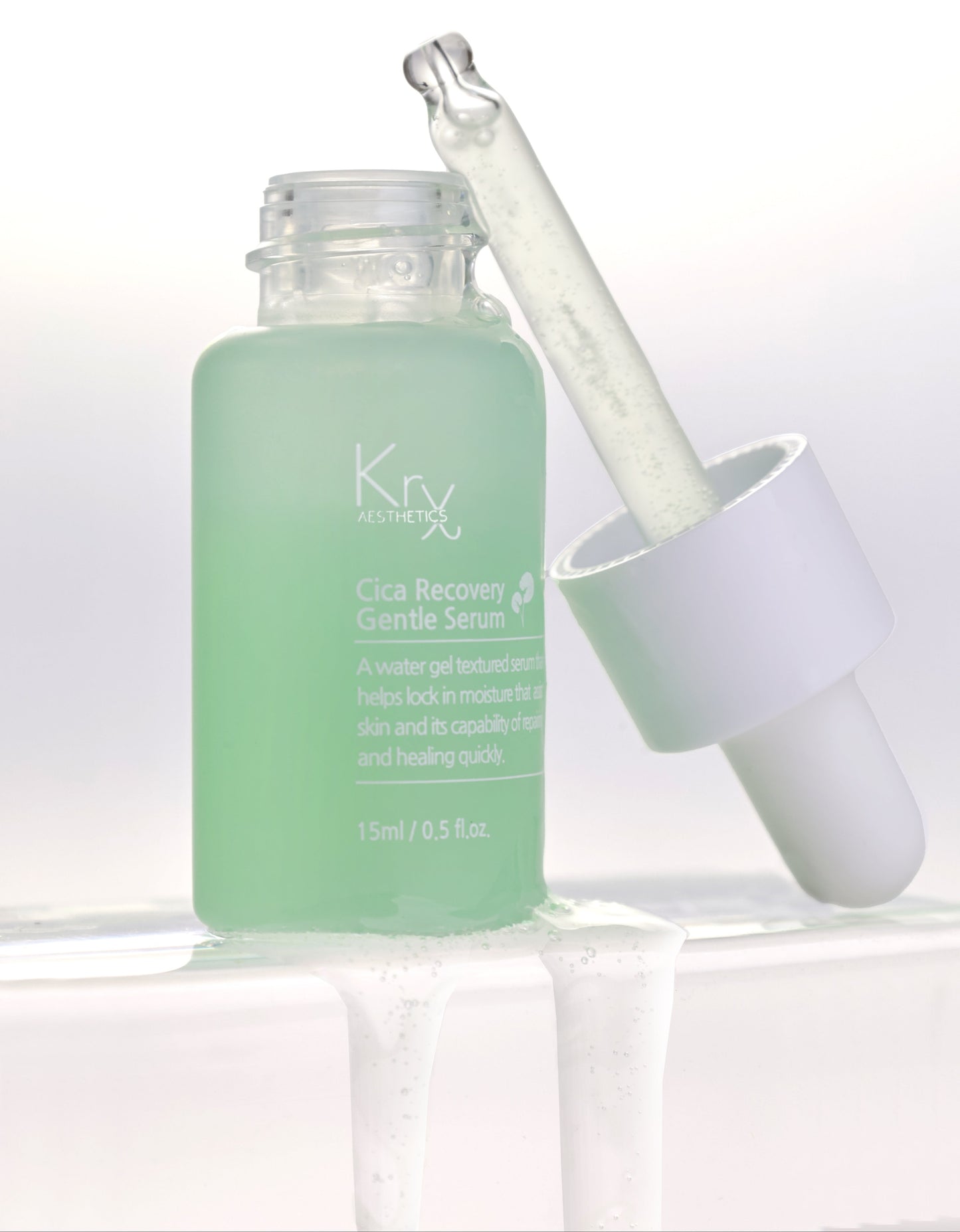 Close-up of the KrX Cica Recovery Gentle Serum texture, enriched with Ceramides and fermented Soybean Extract to actively rebuild a compromised skin barrier and prevent moisture loss.