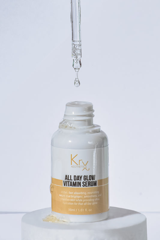 Close-up of KrX All Day Glow Vitamin Serum texture; a stable solution using a Triple Vitamin C complex to solve the problem of daytime dullness and free-radical damage without the irritation of standard ascorbic acid.