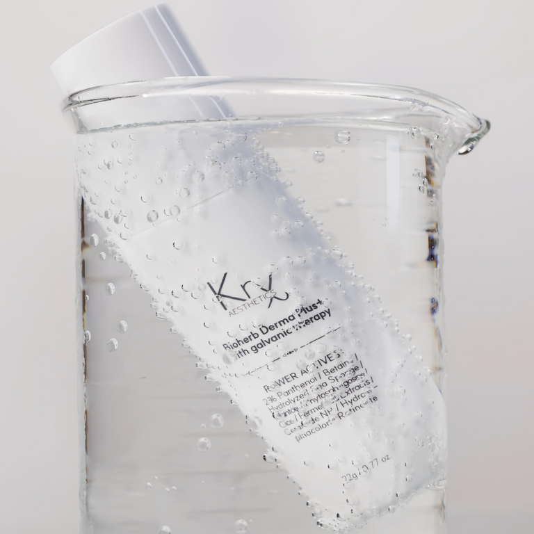 Clinical-strength KrX Bioherb Derma Plus+ showing self-activating galvanic therapy for advanced Korean skin renewal and cellular rejuvenation.