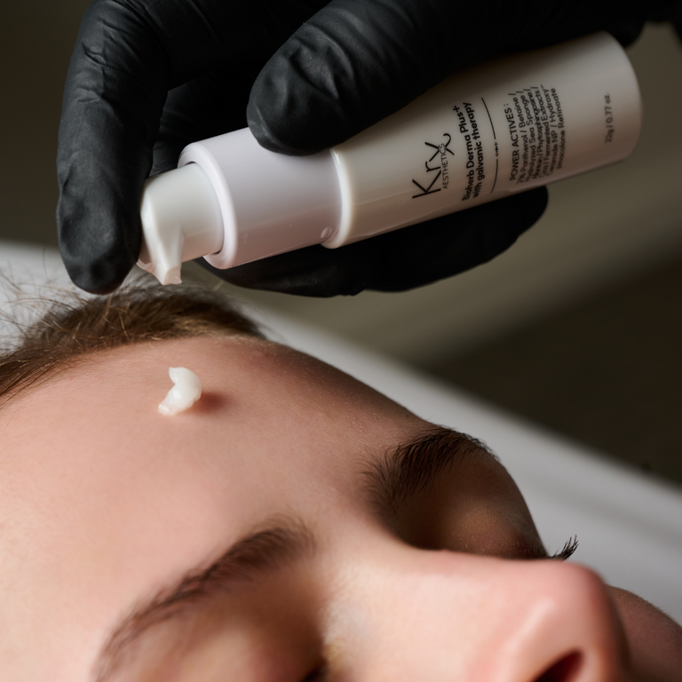 Application of KrX Bioherb Derma Plus+ featuring 3,000 ppm spicules and galvanic microcurrent technology for advanced skin resurfacing.