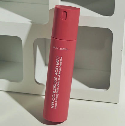 Close-up of the non-comedogenic KrX Hypochlorous Acid Mist spray nozzle, an unscented, vegan mist that eliminates environmental pathogens and extends makeup wear.