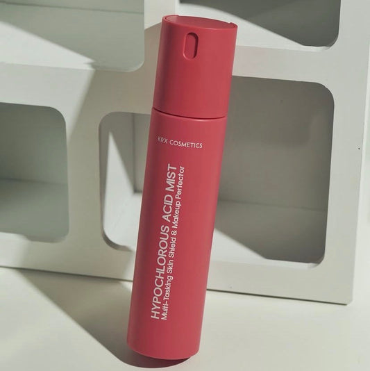 Close-up of the non-comedogenic KrX Hypochlorous Acid Mist spray nozzle, an unscented, vegan mist that eliminates environmental pathogens and extends makeup wear.