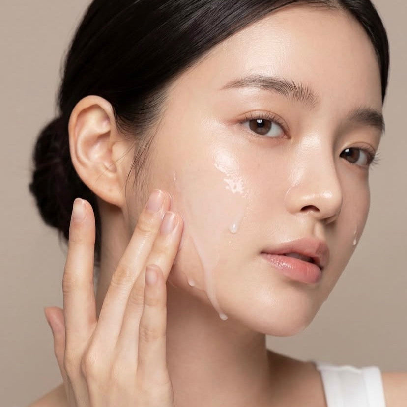 KrX Korean Probiotic Milk Toner; a calming, barrier-safe solution that solves 'angry' skin and redness by coating the face in a soothing, probiotic-rich protective layer.
