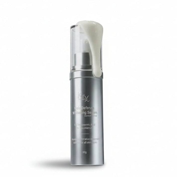 Dispensing the KrX Mela Défense Whitening Serum, a concentrated clinical treatment that fades dark spots and sun damage while supporting the skin barrier.