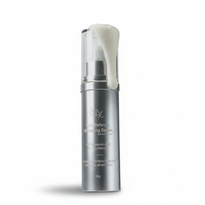 Dispensing the KrX Mela Défense Whitening Serum, a concentrated clinical treatment that fades dark spots and sun damage while supporting the skin barrier.