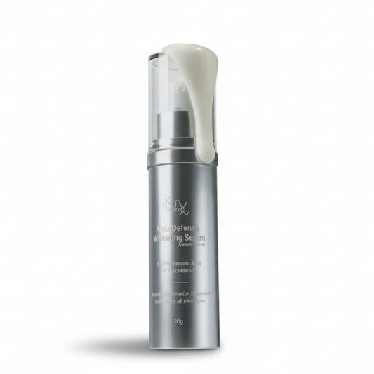 Dispensing the KrX Mela Défense Whitening Serum, a concentrated clinical treatment that fades dark spots and sun damage while supporting the skin barrier.