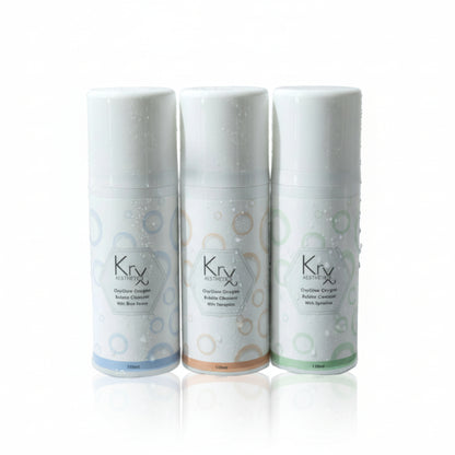 KrX OxyGlow Bubble Cleanser Trio; a skin-cycling solution that solves "changing skin needs" by providing three targeted oxygen formulas to brighten, detox, or calm based on your skin's daily mood.