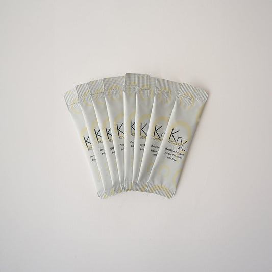 Individual travel-friendly KrX OxyGlow Rice Bubble Cleanser sachets | Clinical K-Beauty
