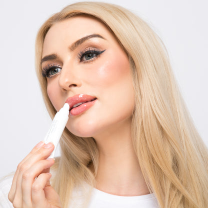 Professional application of KrX Pocket Filler Korean lip gloss; showing the instant smoothing effect on dehydrated lips and the radiant, healthy glow of K-Beauty lip technology.