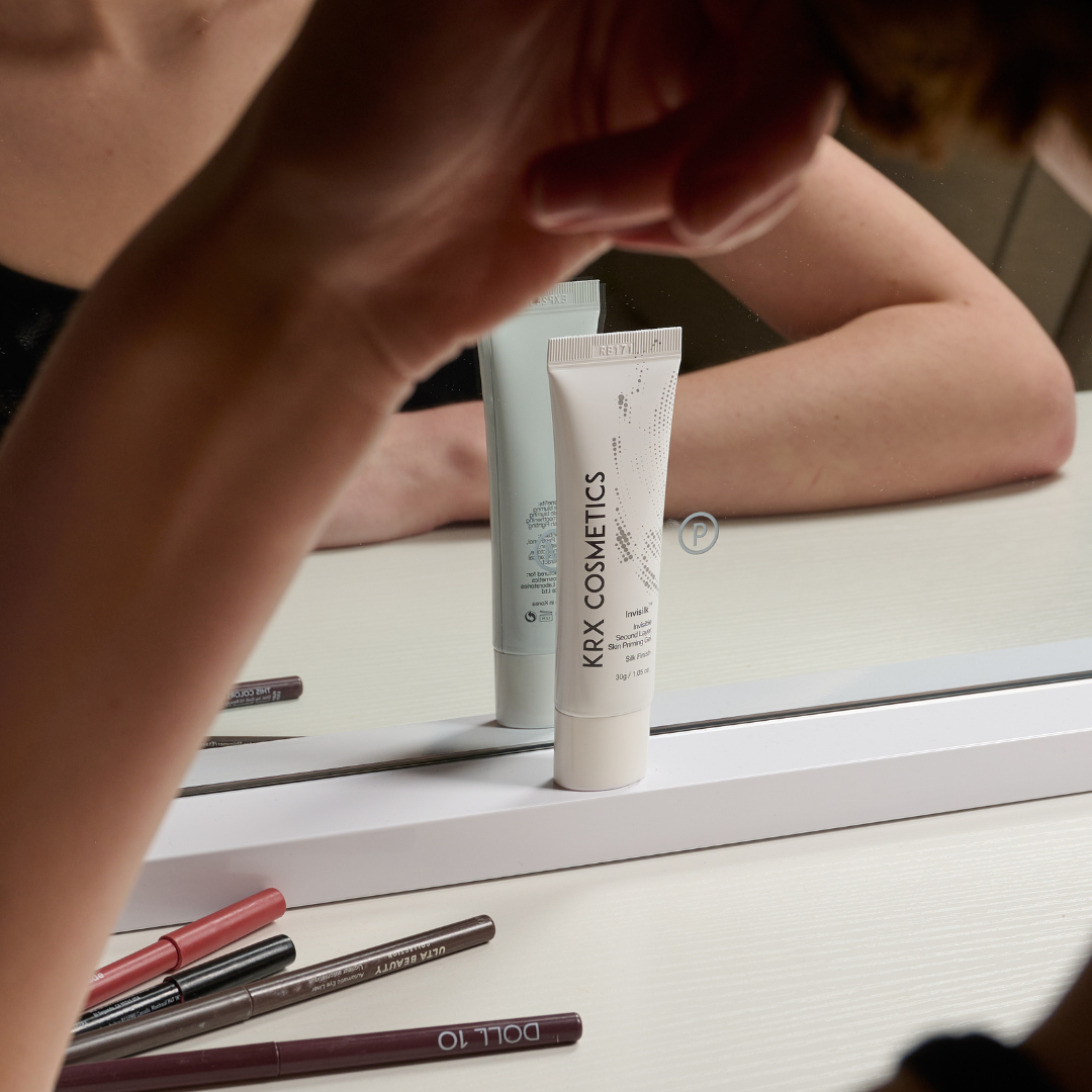 Applying KrX Invisilk priming gel to refine pores and prevent makeup creasing and caking