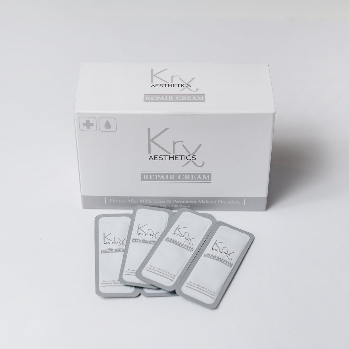 KrX Repair Cream box featuring 100 travel-ready 0.8g pouches formulated to soothe, hydrate, and restore compromised skin after aesthetic treatments.