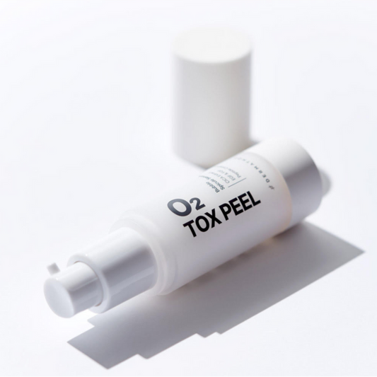 Dermathod O2 Tox Peel Serum in its minimalist luxury packaging, designed to smooth rough texture, refine enlarged pores, and fade post-inflammatory hyperpigmentation.