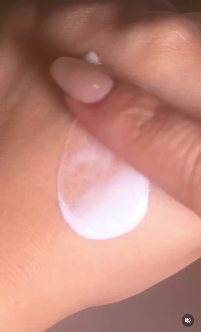 Applying the gentle Pfect-A Solar Elixir Serum Sunscreen, a clinical-grade Korean formula optimized for breathable, non-irritating UV protection after laser resurfacing or chemical peels.