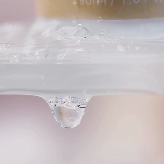 Layering the Quenching Glow Toner and Vitamin Serum from the KrX Deluxe Korean Glow Bundle; a peptide-rich video demonstration of deep hydration and melanin-blocking technology.