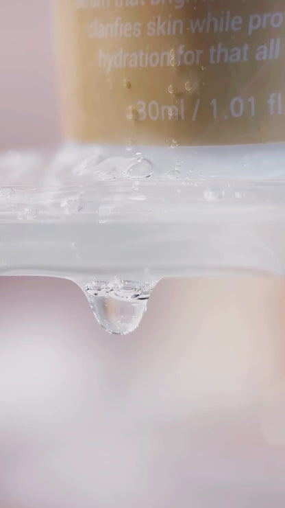 Layering the Quenching Glow Toner and Vitamin Serum from the KrX Deluxe Korean Glow Bundle; a peptide-rich video demonstration of deep hydration and melanin-blocking technology.