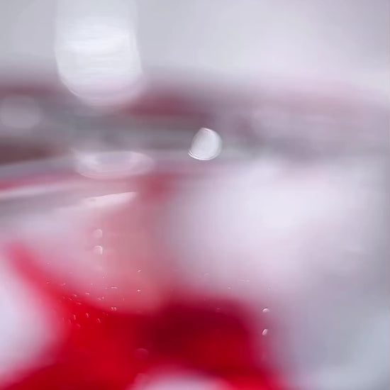 Applying KrX Anti Acne Toner; a pH-balancing K-beauty skincare solution that solves "post-cleanse flushing" by using Zinc PCA and Tea Tree to instantly cool inflammation and soothe reactive acne-prone skin.