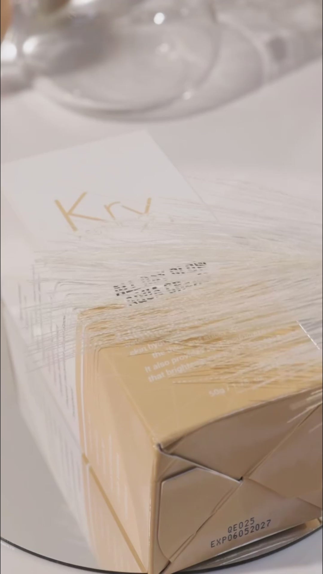 Final steps of the KrX Deluxe Glow Bundle routine featuring the weightless AquaGel Cream for a protected, high-shine Korean glass skin finish.