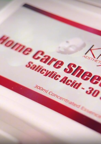 Video demonstrating the high serum-to-mask ratio of the KrX Home Care Mask collection, showing how the liquid-soluble formula is driven into the follicles to clear debris and refine skin texture.