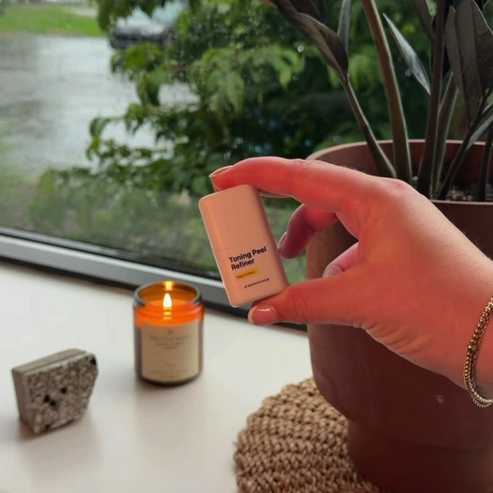 Applying Dermathod Toning Peel Refiner multi-acid at-home peel with Tranexamic Acid and Retinol to fade post-acne marks and smooth uneven skin tone