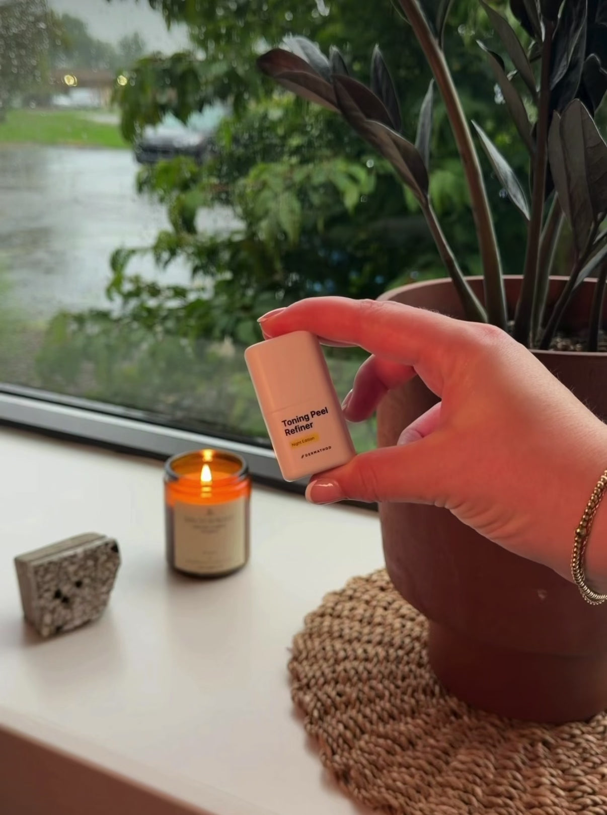 Applying Dermathod Toning Peel Refiner multi-acid at-home peel with Tranexamic Acid and Retinol to fade post-acne marks and smooth uneven skin tone