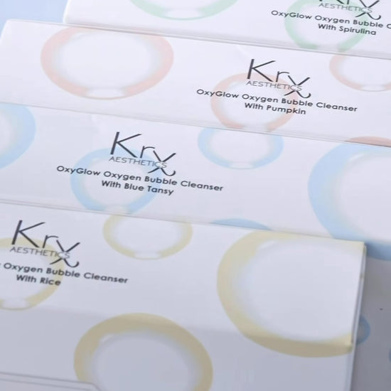 Video showing the four-pack KrX OxyGlow Korean oxygen bubble cleanser sachets for brightening, detoxing, and soothing skin.