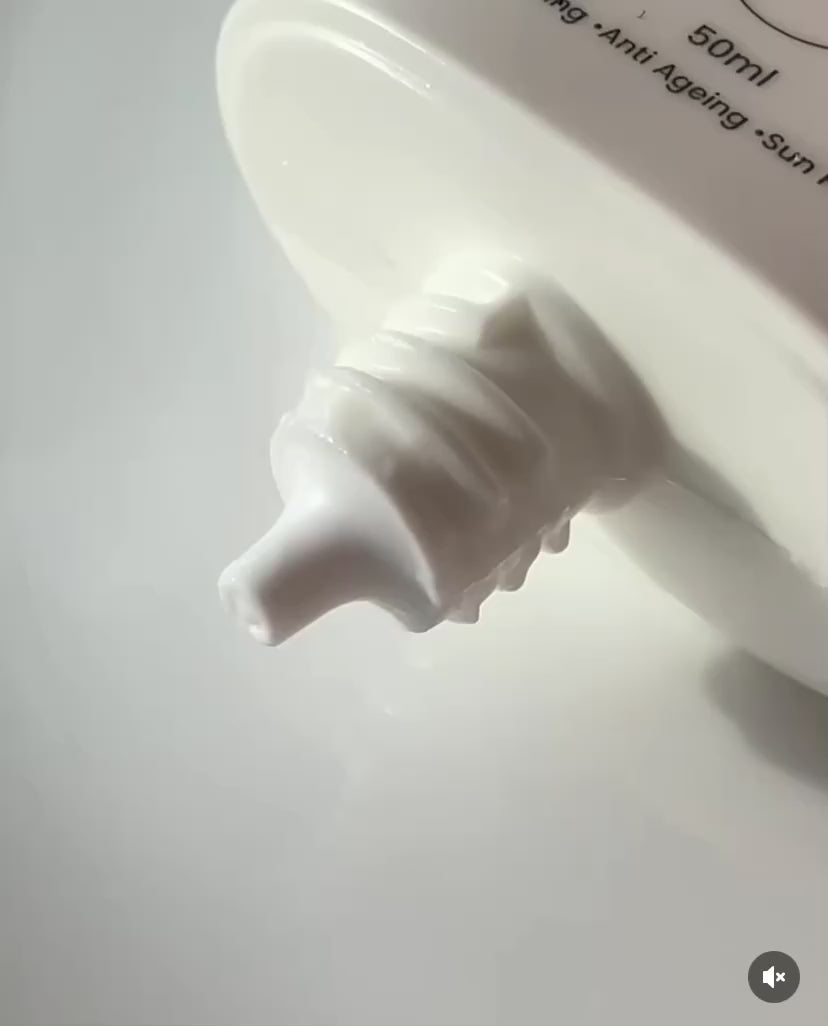 Close-up of the non-comedogenic Pfect-A Solar Elixir Serum, a hydrating Korean sunscreen that leaves a radiant, skin-like finish without clogging pores or triggering acne breakouts.