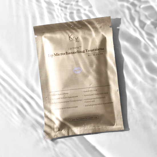 Close-up of the innovative micro-channeling spears on KrX Lip Darts, designed to dissolve into the skin for targeted delivery of plumping hyaluronic acid and jojoba oil.