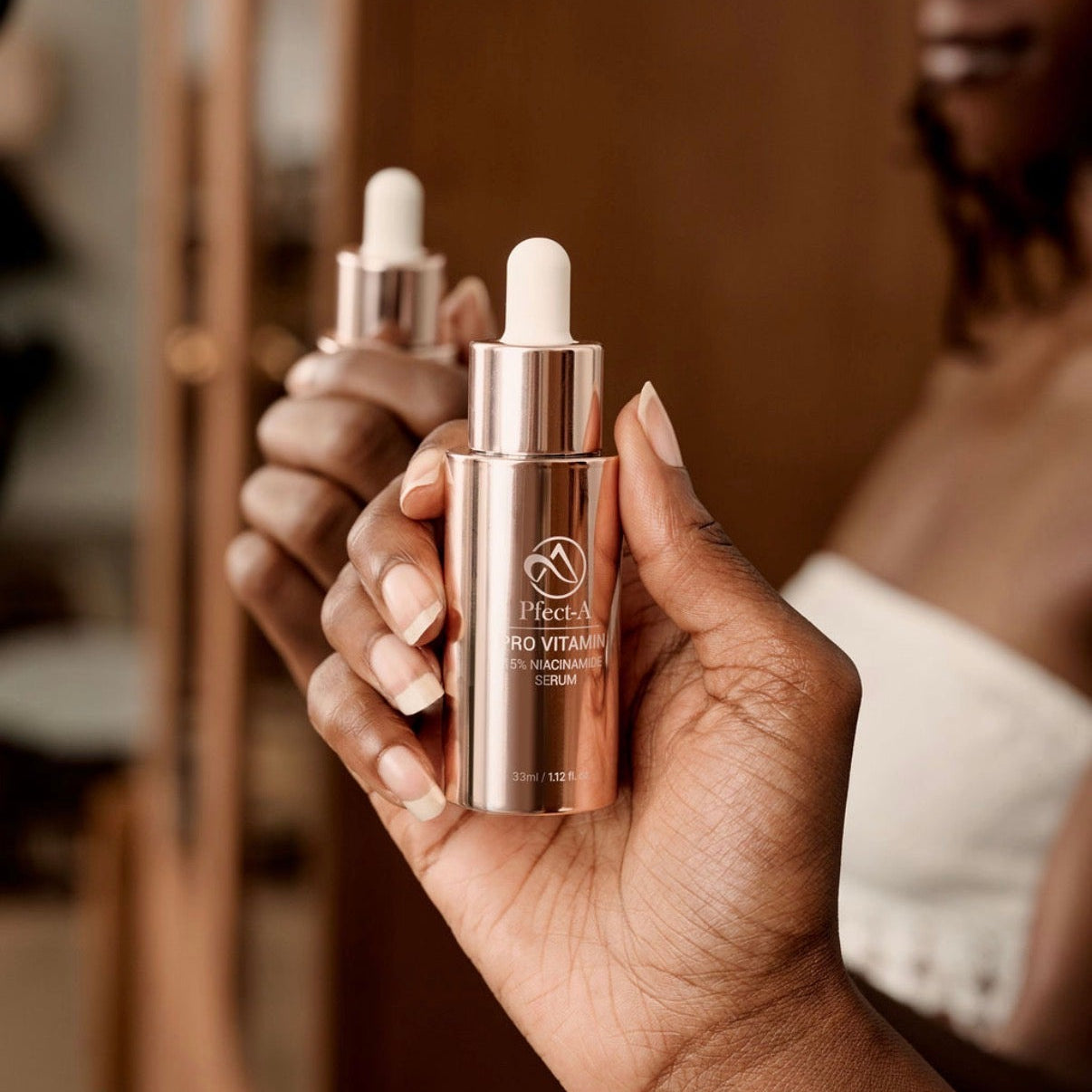 Pfect-A Pro Vitamin Niacinamide 15% Serum in a gold luxury bottle, a clinical Korean barrier repair serum for oily skin.