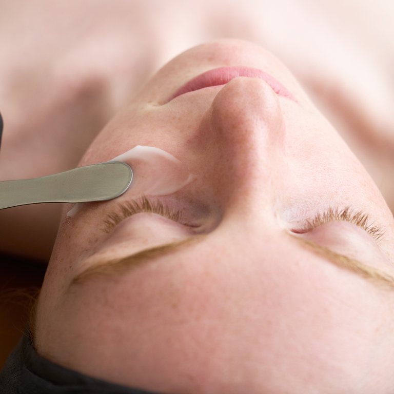 KrX AquaGel™ Cream being applied; a soothing solution featuring Calendula and rice water that solves post-wash redness and irritation while restoring moisture balance.
