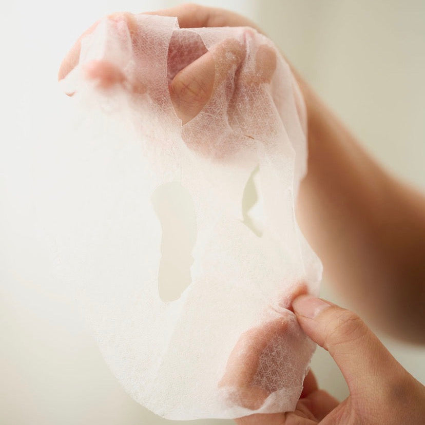 Premium Korean Thesera biocellulose mask material detail - A moisture-locking barrier mask infused with Ceramide NP and Nobel Prize-winning Fullerene antioxidants.