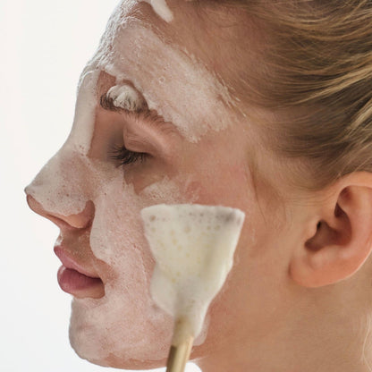Applying Thesera Epidermis Balance Korean glycolic acid foam cleanser to cheeks to exfoliate dead skin and refine texture.