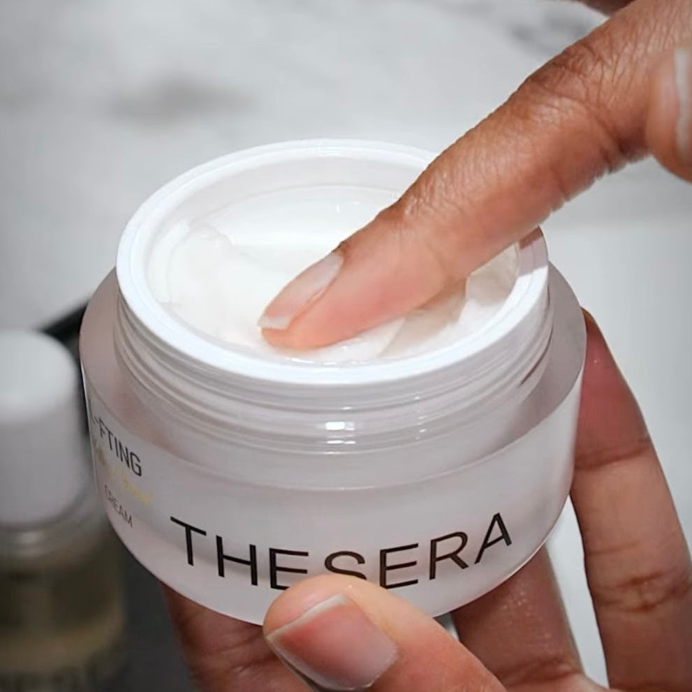 Close-up of the rich, thread-like texture of Thesera L-FTING Melting Thread Cream, a professional Korean anti-glycation formula utilizing nano-chitosan melting threads for needle-free face lifting.